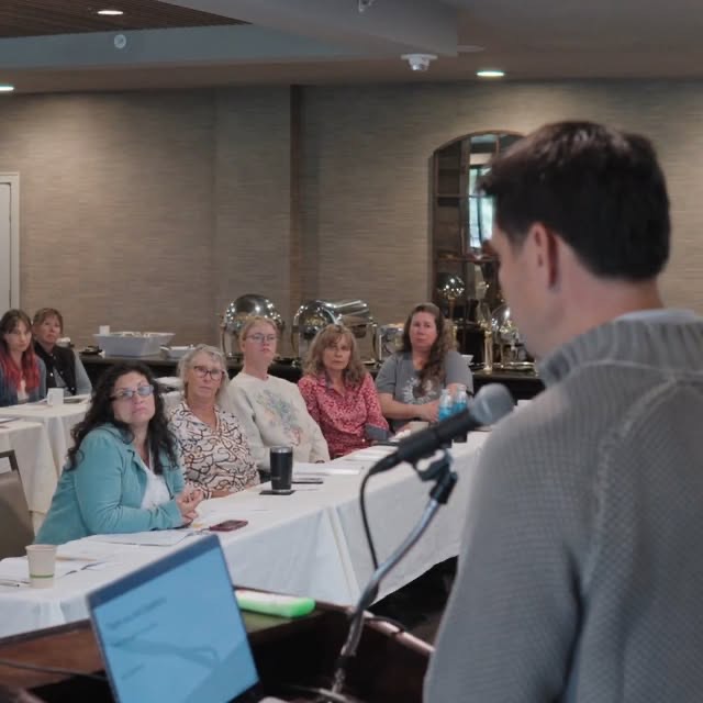 Brian teaching a room of riding-school owners.