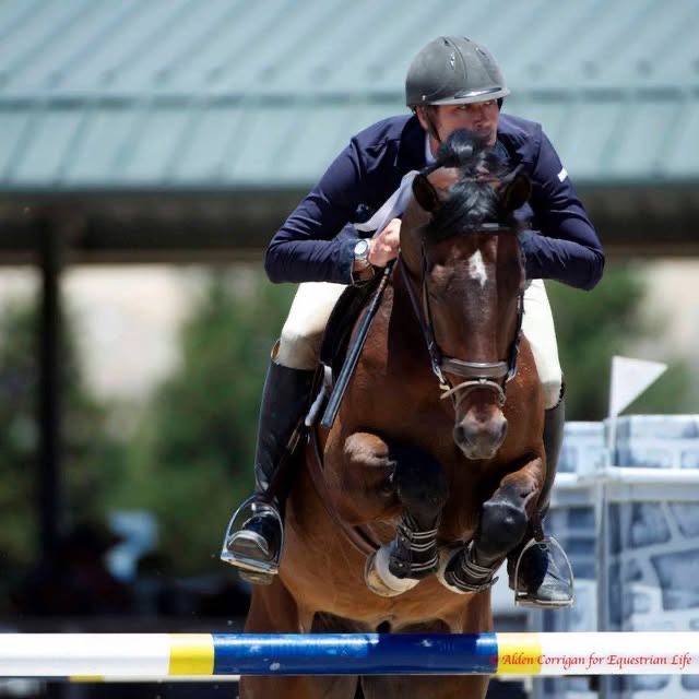 Brian competing over fences.